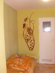 Naklejka na ścianę flora, gałążka, kwiaty, motyl. 