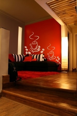 Naklejka filiżanka kawy i ziarnka kawowe na ścianie w jadalni z weluru